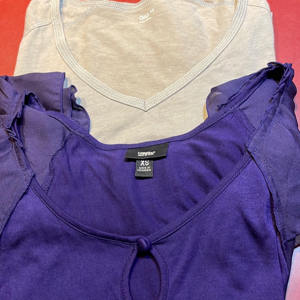 Bundle Two Extra Small Shirts.